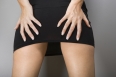 Female hands on buttocks.
