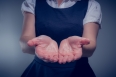 Close up mid section of businesswoman presenting your product with hands