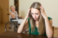 Woman and handicapped female having quarrel